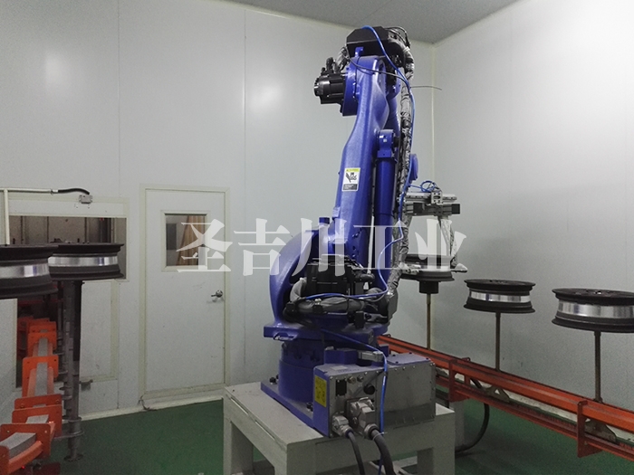 Clamping and turning mechanism on both sides of the robot to be solidified after aluminum wheel base powder