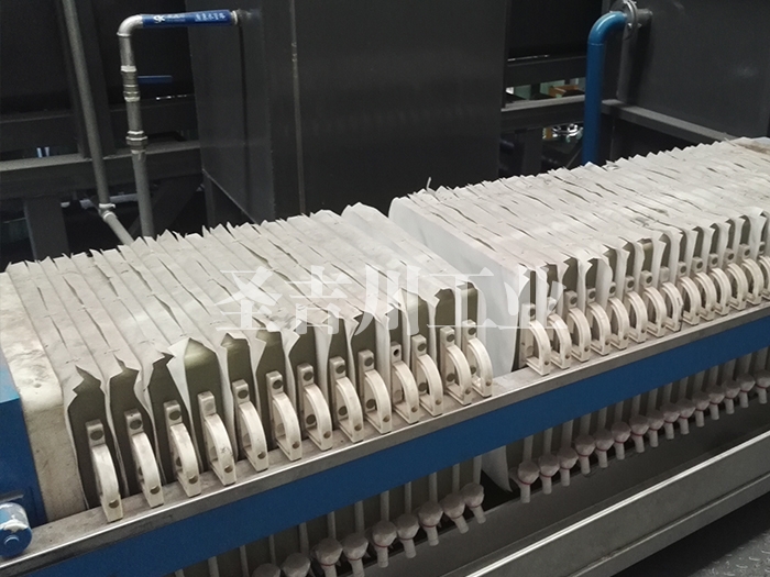 Phosphating slag removal filter press system