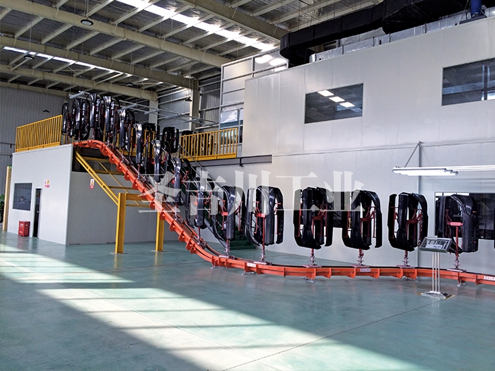 Ground rail vertical chain conveyor line