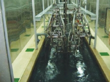 Motorcycle, electric vehicle frame electrophoresis tank